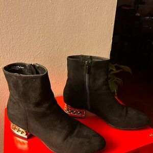 Timeless black booties — classic, comfy, and ready to elevate any look.